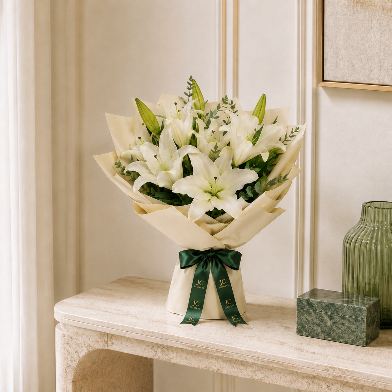White Lily Edit arrangement in pure white, a calm choice for sympathy flowers in Dubai